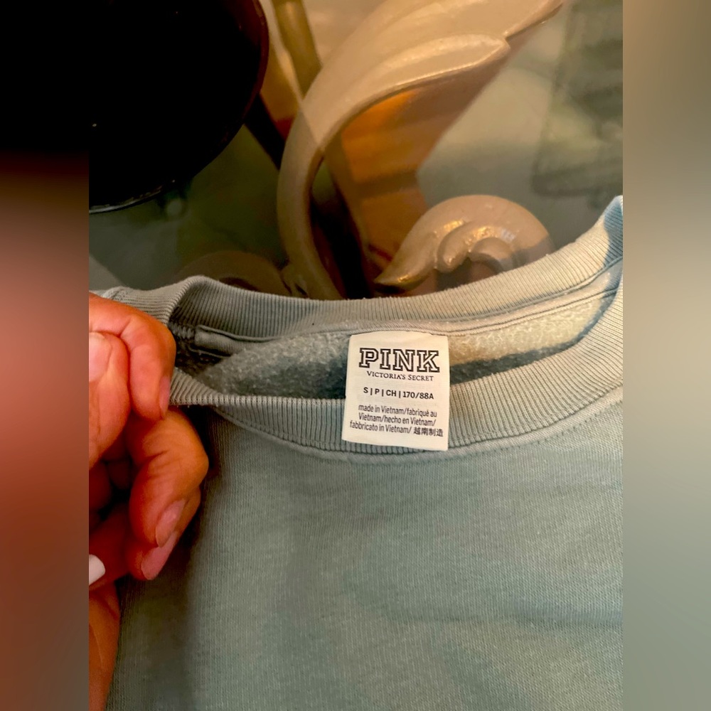 Crewneck sweatshirt runs large. Comfy. Size Small. Im usually Medium/Large
